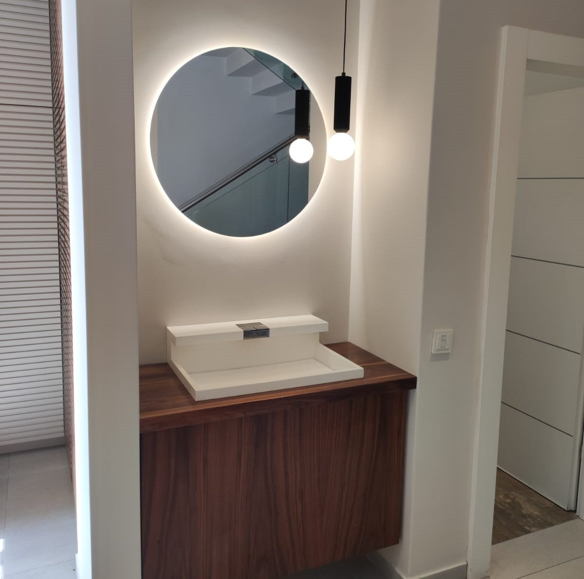 Rechargeable illuminated mirror