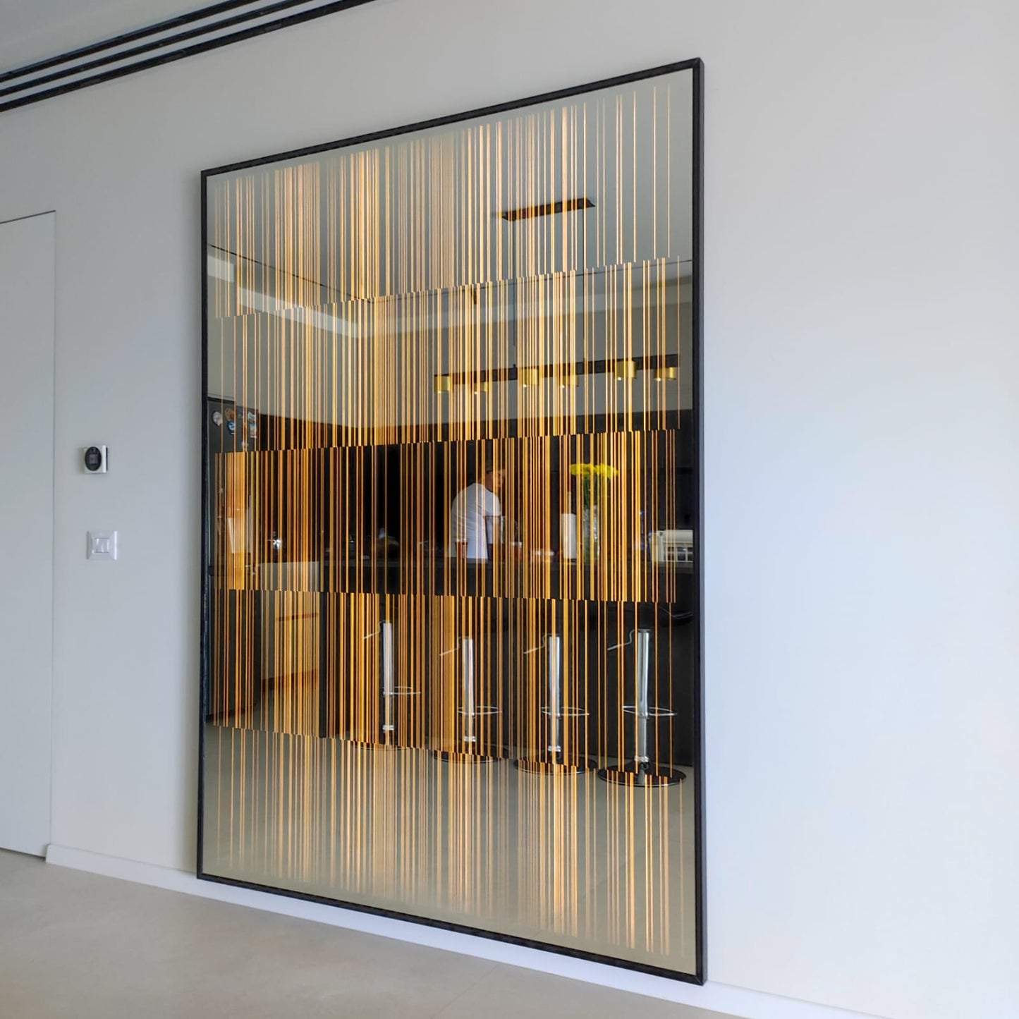 Illuminated mirror for the living room